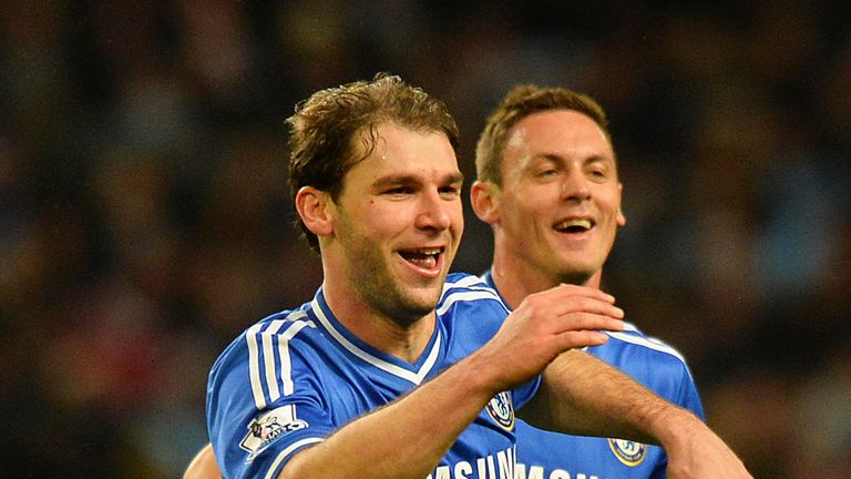 Chelsea's Serbian defender Branislav Ivanovic (L) celebrates after scoring his team's first goal during an English Premier League football match between Ma