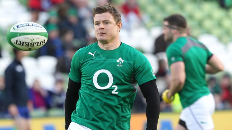 Ireland centre Brian O'Driscoll  warms up ahead of the start of the Six Nations international rugby union match between Ireland and Scotland at the Aviva S