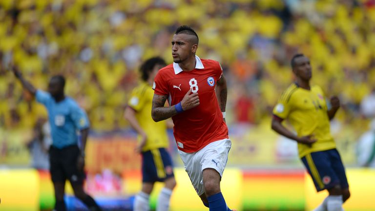 Chile midfielder Arturo Vidal celebrates after scoring a penalty against Colombia