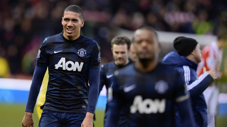 Manchester United defender Chris Smalling reacts as he leaves the pitch after the Premier League football match against Stoke City