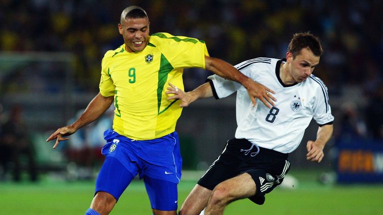 Dietmar Hamann of Germany fends off Brazil's Ronaldo in the 2002 World Cup final