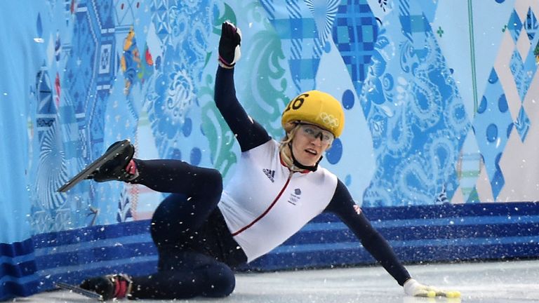 Great Britain's Elise Christie falls as she competes in the women's short track 1000m semif-inals at the Iceberg Skating Palace during the Winter Olympics