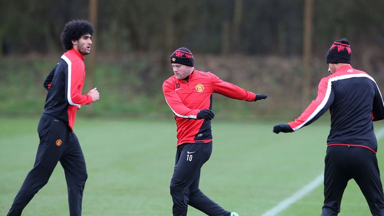 Marouane Fellaini and Wayne Rooney train ahead of trip to Greece