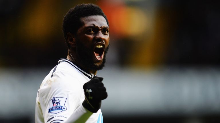 Emmanuel Adebayor celebrates giving Spurs the lead with a well-taken strike against Everton.