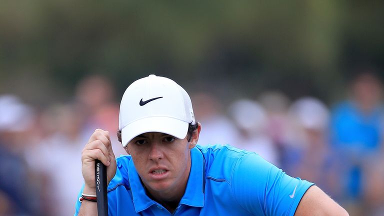 Rory McIlroy of Northern Ireland putting during the third round of the Dubai Desert Masters in Abu Dhabi
