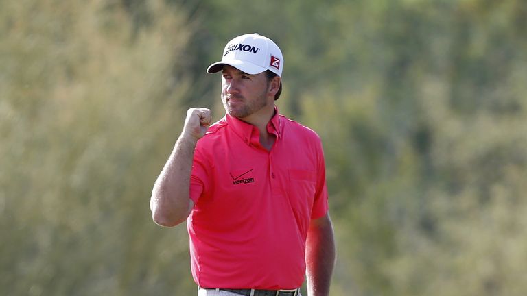 Graeme McDowell of Northern Ireland reacts to a putt on the 18th hole during the second round of the World Golf Championships - Accenture Match Play
