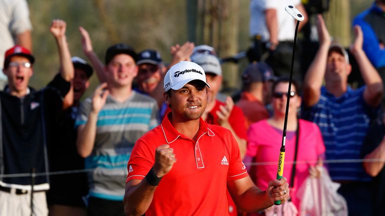 Jason Day reacts to defeating Victor Dubuisson of France on the 23rd hole of the WGC Match Play Championship