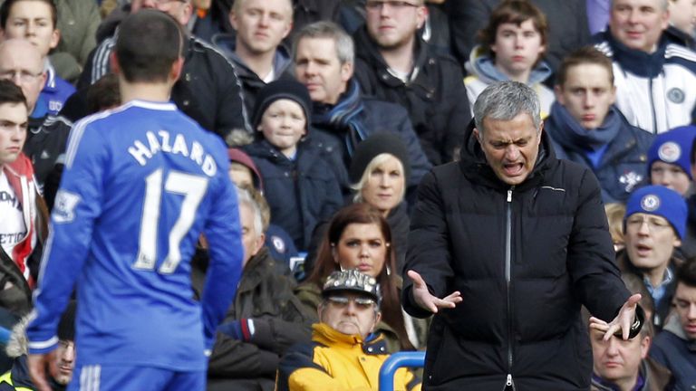 Chelsea's Portuguese manager Jose Mourinho (R) reacts during the English Premier League football match between Chelsea and Newcastle United 