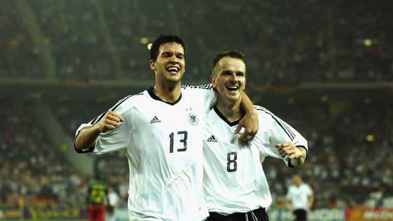 Michael Ballack and Dietmar Hamann of Germany celebrate during the FIFA World Cup Finals 2002 Group E match between Germany and Cameroon