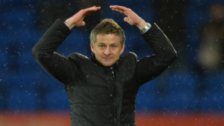 Ole Gunnar Solskjaer: Saluted the Cardiff fans after his first Premier League win