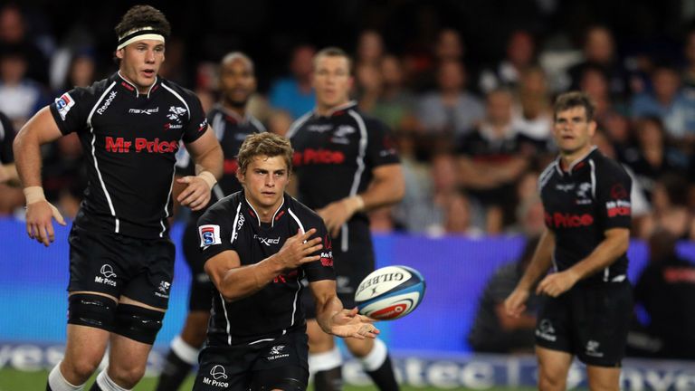 Patrick Lambie gets the Sharks' back division in motion v Stormers. Kings Park, Durban. March 2 2013
