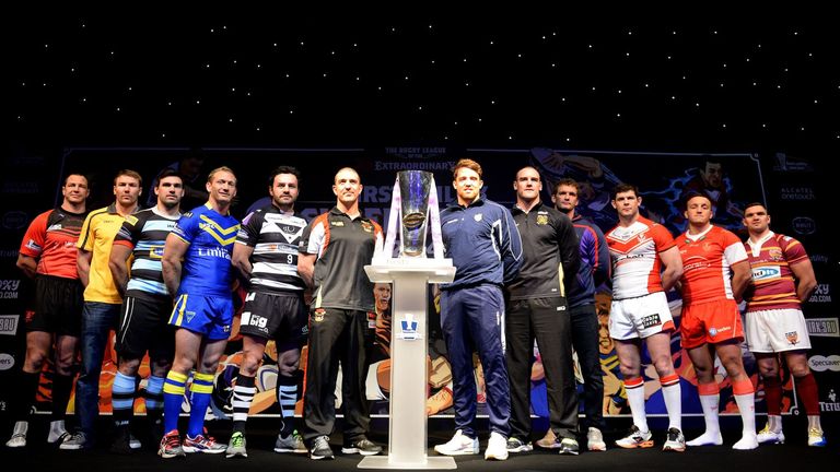 The team captains line up during the official launch of the 2014 First Utility Super League season in Manchester