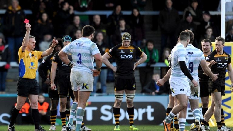 Referee Tim Wigglesworth shows a red card to Tomas O'Leary of London Irish 
