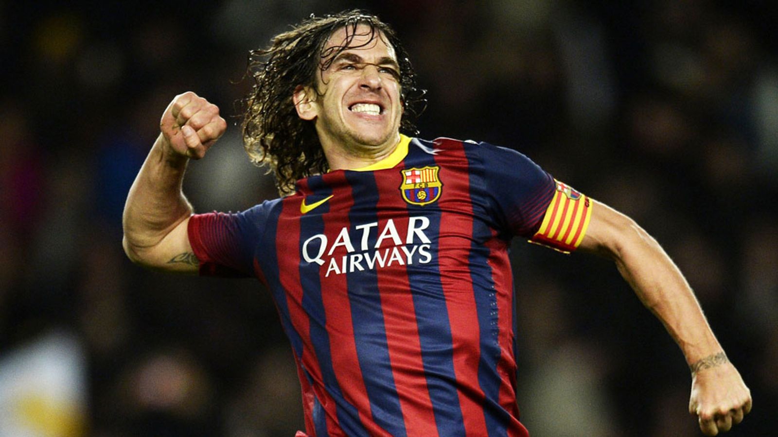 Carles Puyol celebrates his debut goal for Barcelona against Real Madrid in 2003.