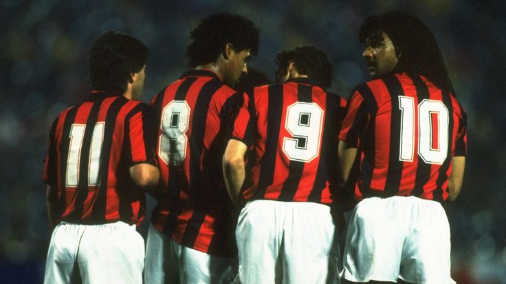 Carlo Ancelloti, Frank Rijkaard, Marco Van Basten and Ruud Gullit of AC Milan line up in the wall versus Real Madrid during 1989 European Cup semi-final.