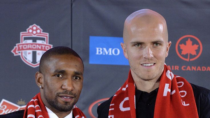 Jermain Defoe (L) and Michael Bradley attend a press conference where they were introduced by Toronto FC at Real Sports Bar & Gr