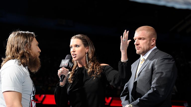 Daniel Bryan (L) forced Triple H to accept his WrestleMania challenge on Raw