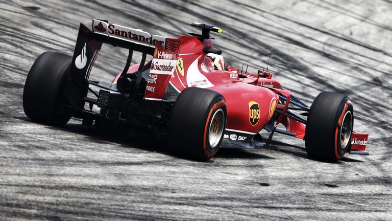 A Ferrari navigates another of F1's well-marked roads