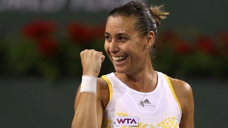- Flavia Pennetta of Italy celebrates following her victory over Li Na of China during the BNP Paribas Open at Indian Wells