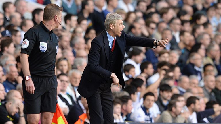 Arsene Wenger: Urges his side on at White Hart Lane