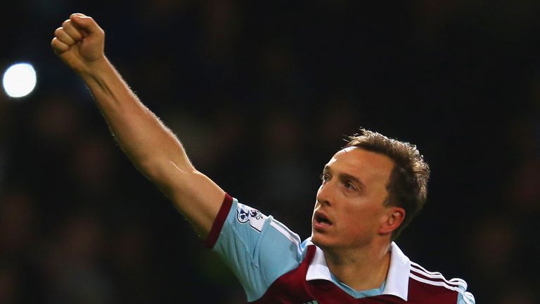 Mark Noble of West Ham celebrates scoring the opening goal from the penalty spot against Hull