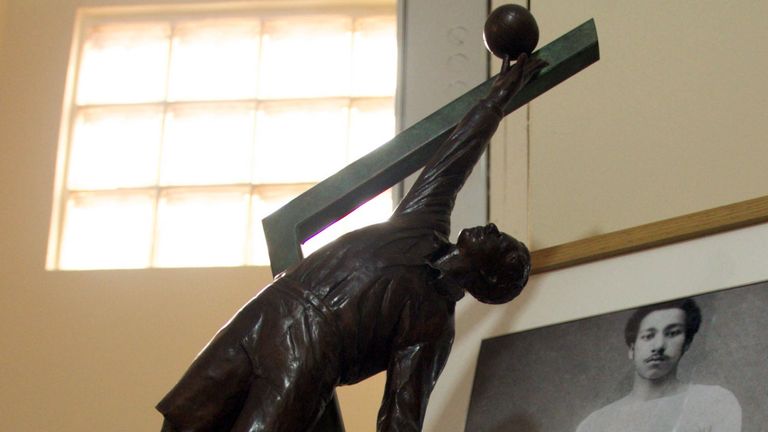 A statue and portrait of late footballer Arthur Wharton
