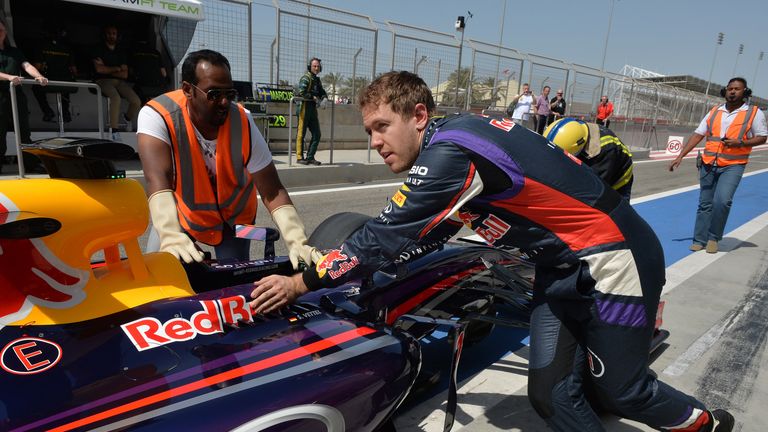 Sebastian Vettel breaks down at the end of the pitlane
