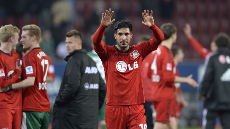 Leverkusen's midfielder Emre Can (C) reacts after the German first division Bundesliga football match FC Augsburg vs Bayer Leverkusen