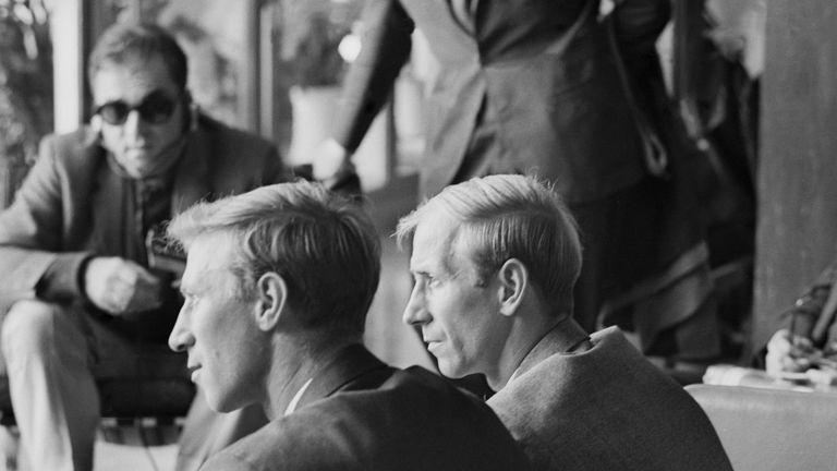 Brothers Jack and Bobby Charlton attending a reception at the Royal Garden Hotel in Kensington with other members of the victorious England World Cup team.