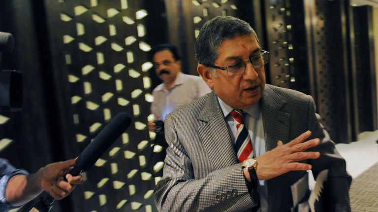International Cricket Council (ICC) Chairman N. Srinivasan of India (C) gestures after attending a board meeting in Singapore on February 8, 2014. The Inte