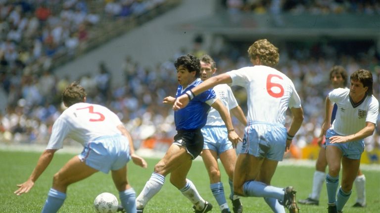 Diego Maradona of Argentina takes on a host of England players during the 1986 World Cup quarter-final at the Azteca Stadium
