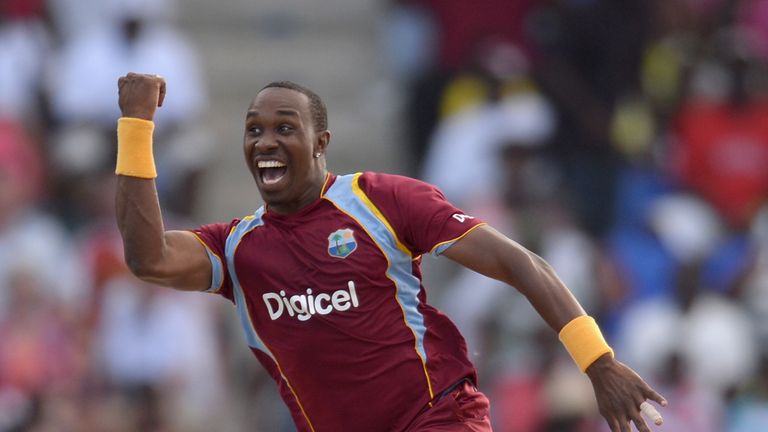 Dwayne Bravo of the West Indies celebrates catching and bowling Joe Root of England during the 2nd One Day International