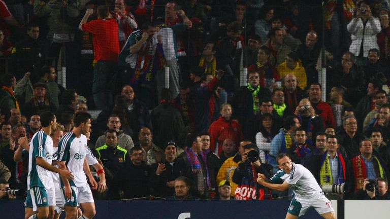 Liverpool striker Craig Bellamy celebrates with his 'Golf Swing' after scoring during the UEFA Champions league game with Barcelonan