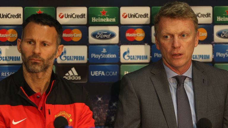 David Moyes of Manchester United speaks at a press conference alongside Ryan Giggs