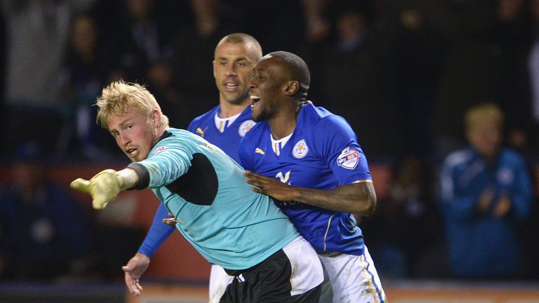 LEICESTER, ENGLAND - MARCH 25: Leicester goalkeeper Kasper Schmeichel celebrates after his shot on goal was headed into the net by his team-mate Chris Wood
