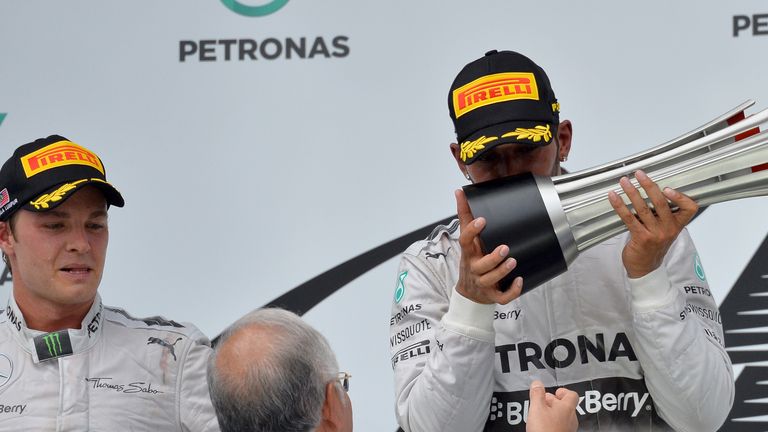 Lewis Hamilton celebrates victory