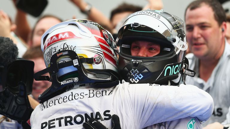 Lewis Hamilton and Nico Rosberg embrace