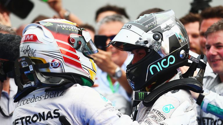Lewis Hamilton and Nico Rosberg embrace