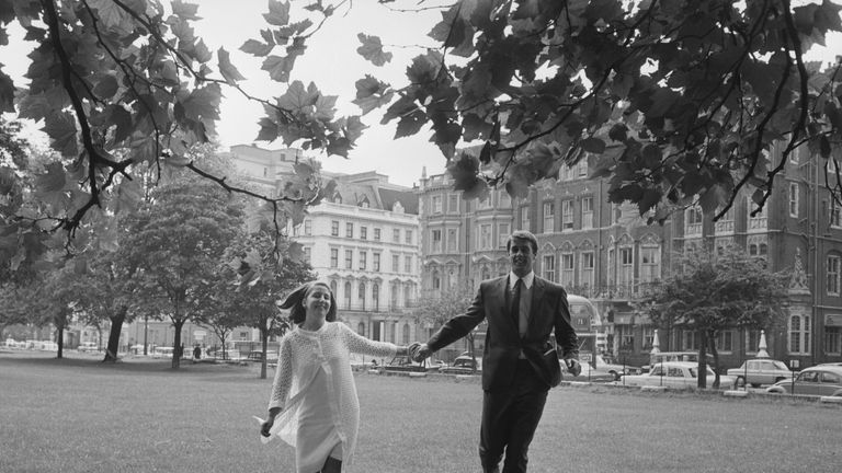 England footballer Geoff Hurst and his wife Judith on their way to the Royal Garden Hotel in Kensington for a reception.