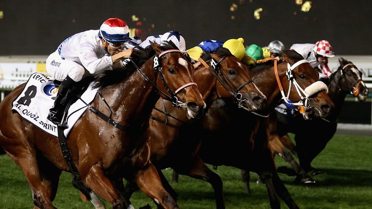 DUBAI, UNITED ARAB EMIRATES - MARCH 29:  Amber Sky ridden by Joao Moreira wins the Al Quoz Sprint during the Dubai World Cup at the Meydan Racecourse on Ma