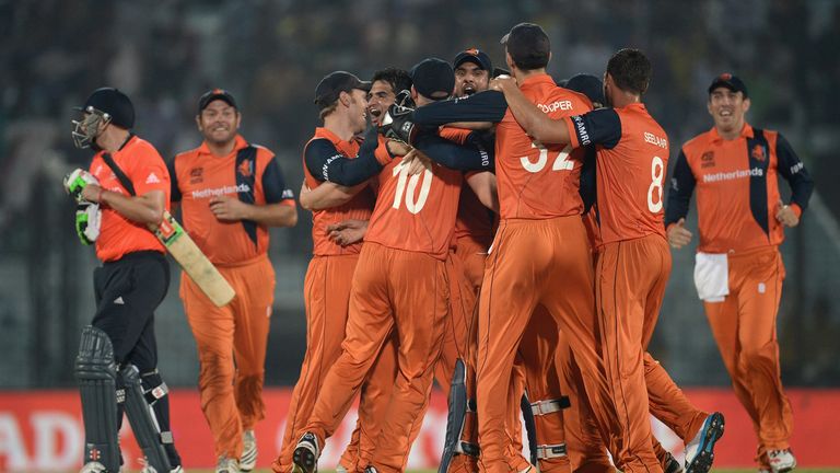 Netherlands players celebrate taking the final wicket in their 45-run win over England in the ICC World Twenty20