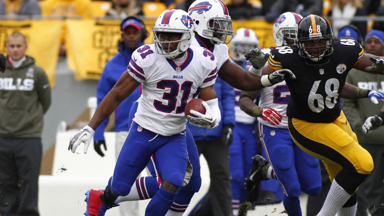 Jairus Byrd  of the Buffalo Bills runs after catching an interception against the Pittsburgh Steelers 