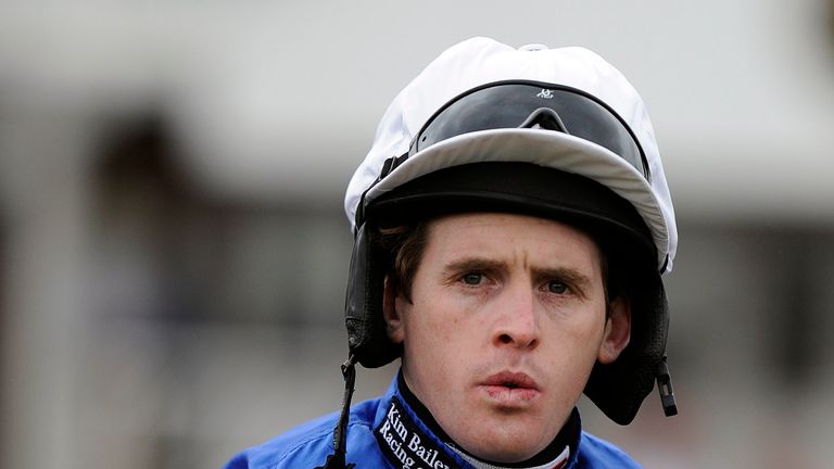 Jason Maguire poses at Newbury racecourse