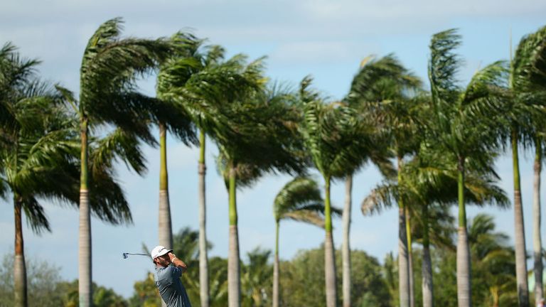 Dustin Johnson: American has a share of the lead after strong winds hit Doral on day two