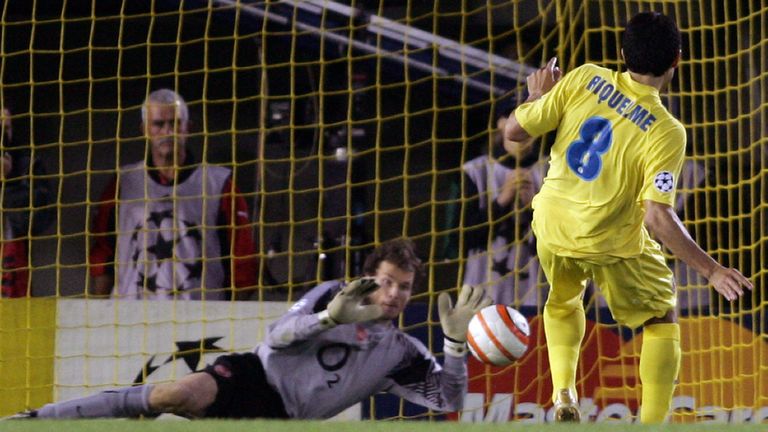Arsenal's German goalkeper Jens Lehmann saves a penalty shot by Villarreal's Argentine Juan Roman Riquelme during their Champions League semi-final in 2006