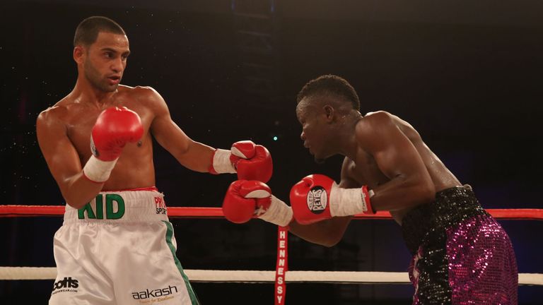 Kid Galahad (left) in action in victory over Isaac Nettey during the featherweight bout at Glow at the Bluewater