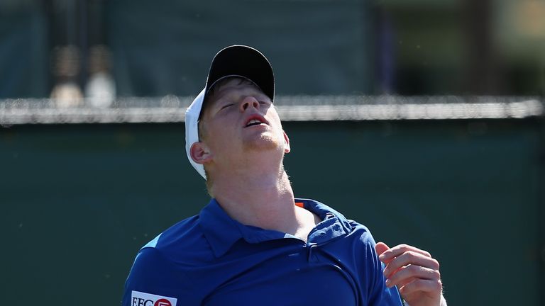 Kyle Edmund of Great Britain dejected after losing to to Julien Benneteau of France in Miami