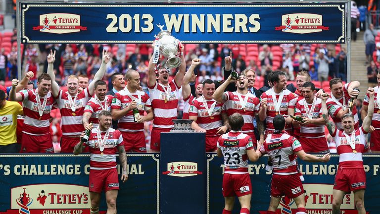Sean O'Loughlin lifts the trophy after Wigan Warriors won the Tetley's Challenge Cup Final between Wigan Warriors and Hull FC