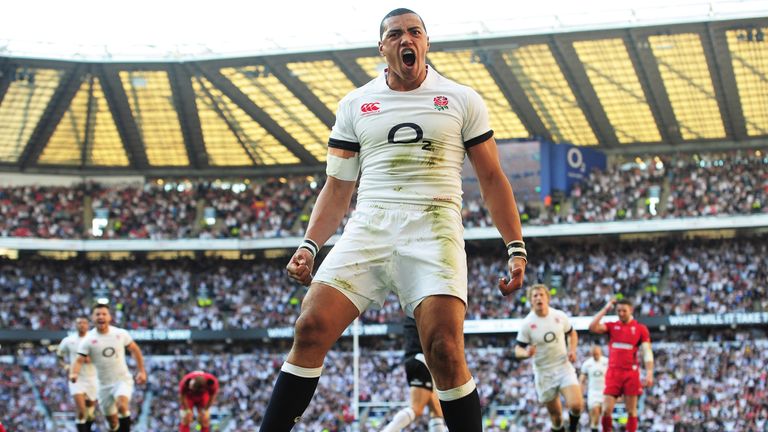 Luther Burrell of England celebrates as he scores their second try during the Six Nations match against Wales. Twickenham, Mar 9 2014.