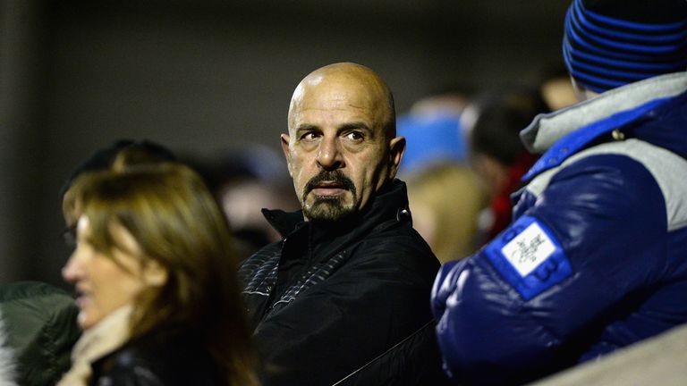 Salford Red Devils owner Marwan Koukash watches from the stands duringa pre-season match